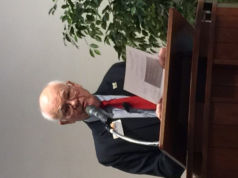 Dr. Garrett Adams speaking at the Unitarian Church